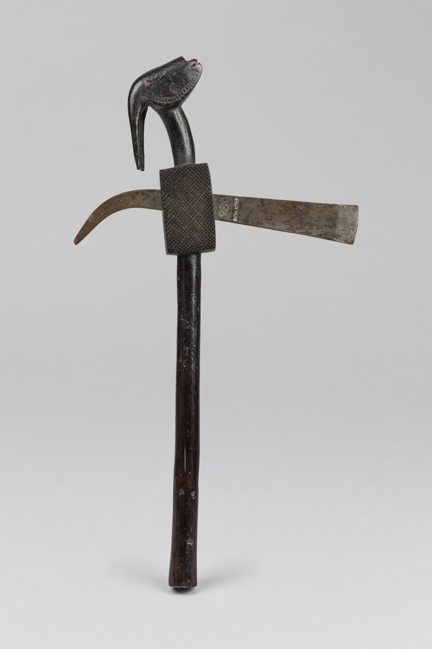 Ceremonial Axe with Carved Animal Head