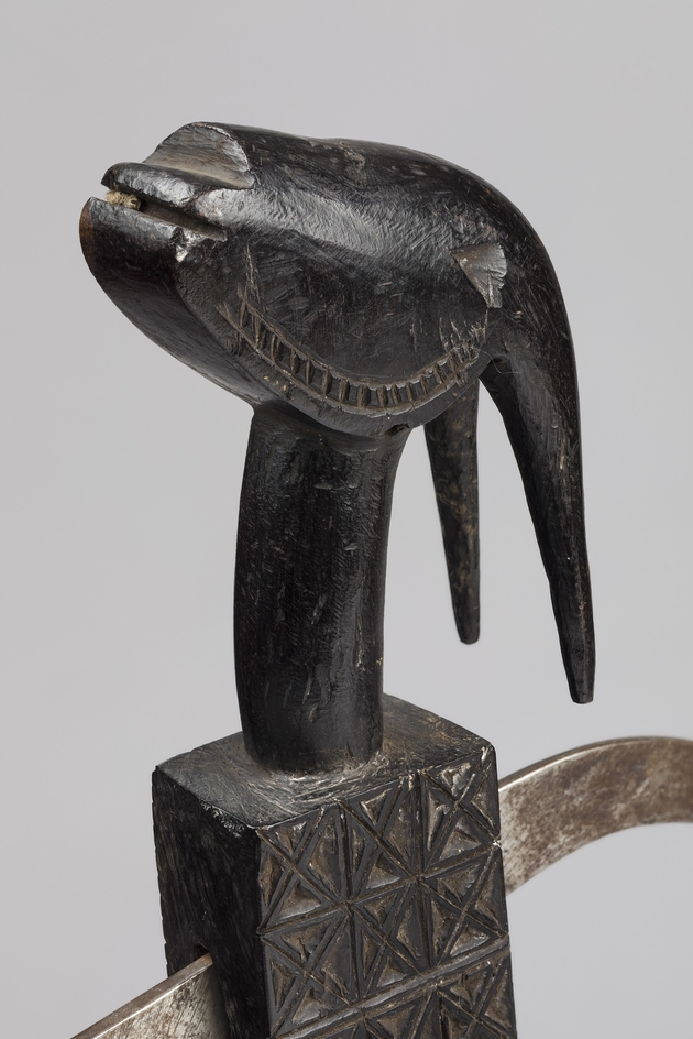 Ceremonial Axe with Carved Animal Head